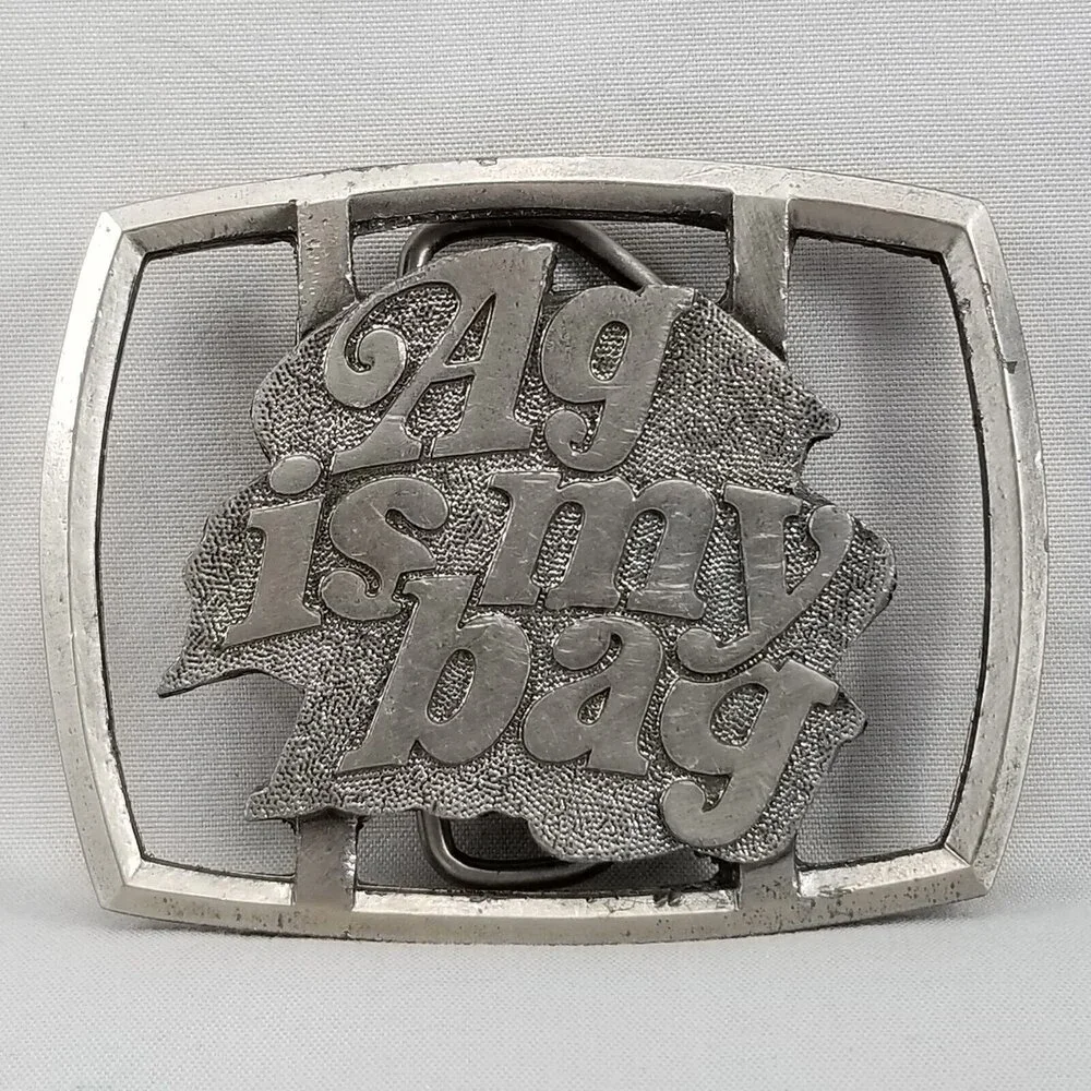 Vintage Belt Buckle 1977‎ Reiman Publications 